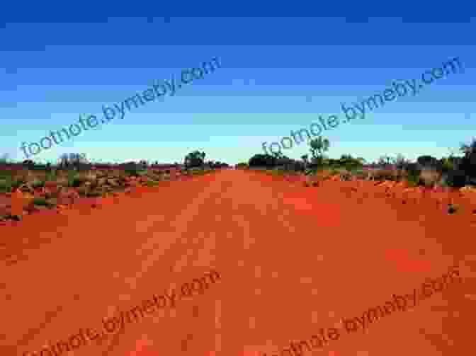 A Breathtaking Dirt Road Snaking Through The Vast Red Outback Of Australia Motorbike Paradise Down Under David J Schmidt