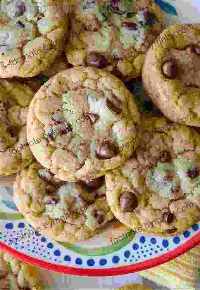 A Close Up Image Of A Freshly Baked Chocolate Chip Cookie, With Golden Brown Edges And Melted Chocolate Chips Visible Throughout. Food Americana: The Remarkable People And Incredible Stories Behind America S Favorite Dishes (Humor Entertainment And Pop Culture)