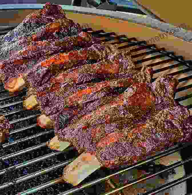 A Juicy Rack Of BBQ Ribs On A Grill, With Smoke Rising Around It Let S Grill Alabama S Best BBQ Recipes