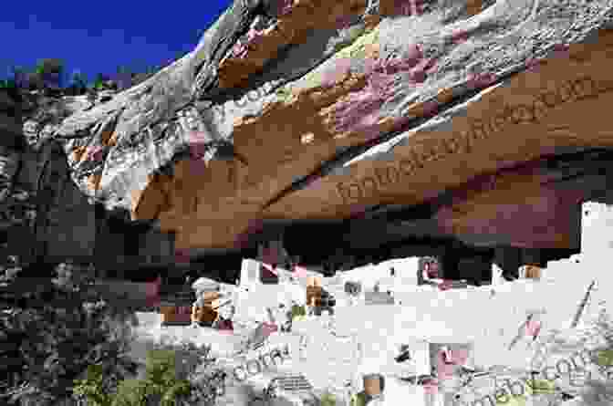 Ancient Cliff Dwellings Nestled Amidst A Desert Landscape, Representing The Southwest's Rich Native American Heritage And Natural Beauty. American Nations: A History Of The Eleven Rival Regional Cultures Of North America