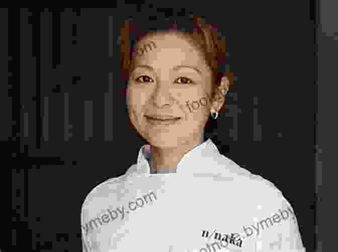 Portrait Of Niki Nakayama, A Japanese American Chef With Short Hair, Wearing A Chef's Jacket And Smiling Niki Nakayama: A Chef S Tale In 13 Bites